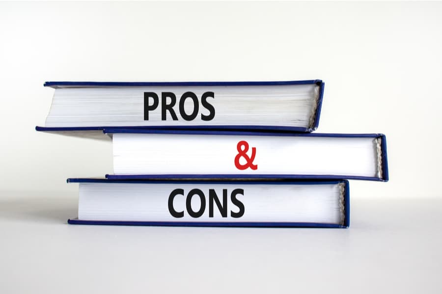 Pros and cons symbol. Books with words 'Pros and cons'. Beautiful white background. Business, pros and cons concept, copy space.