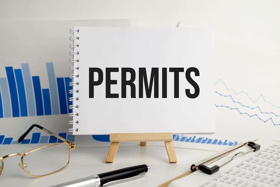 permits in a white notebook business concept
