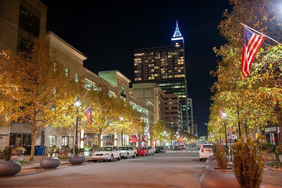 street view downtown of north carolina, usa at night background concept