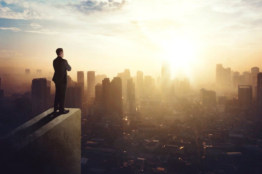 businessman standing on the building rooftop