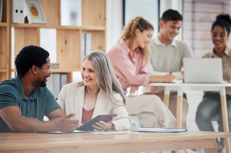 colleagues sit together to talk about growth development 