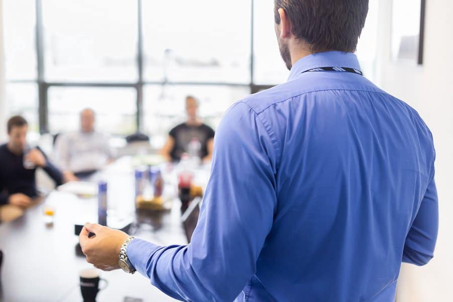 man making a presentation at office