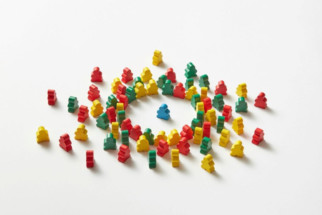 Game pieces cluster like people at networking events, surrounding a blue piece—mimicking high-quality leads around your brand